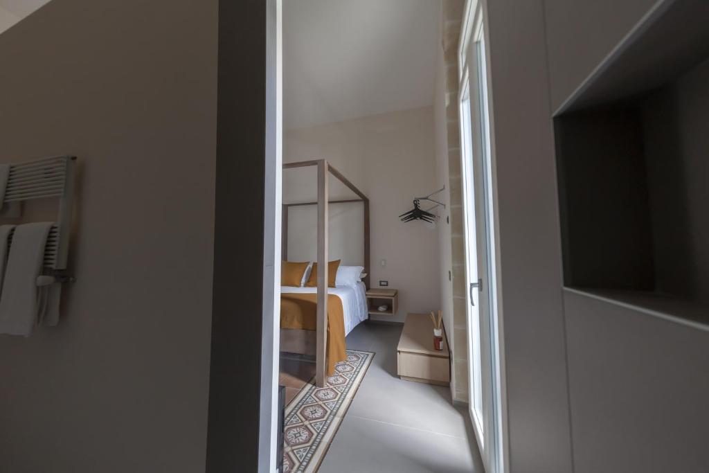 Postel nebo postele na pokoji v ubytování METEORON Luxury Rooms