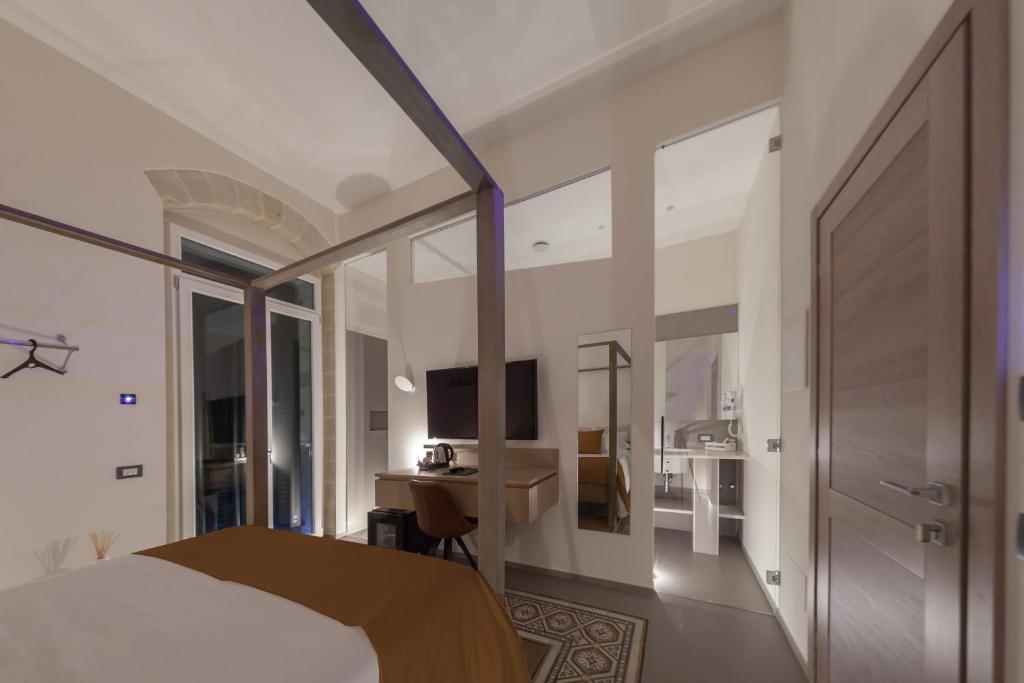 Postel nebo postele na pokoji v ubytování METEORON Luxury Rooms