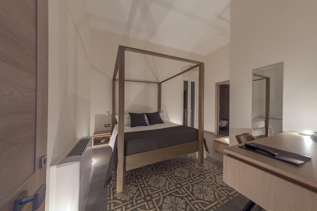 Postel nebo postele na pokoji v ubytování METEORON Luxury Rooms