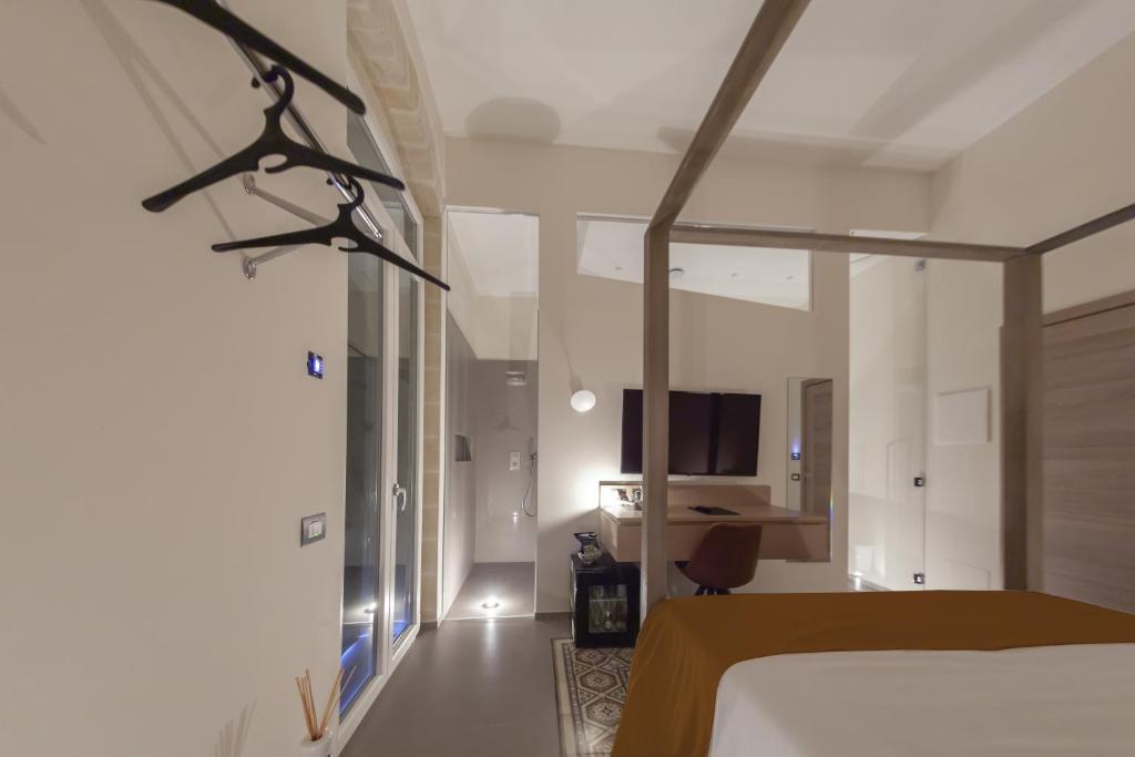 Postel nebo postele na pokoji v ubytování METEORON Luxury Rooms