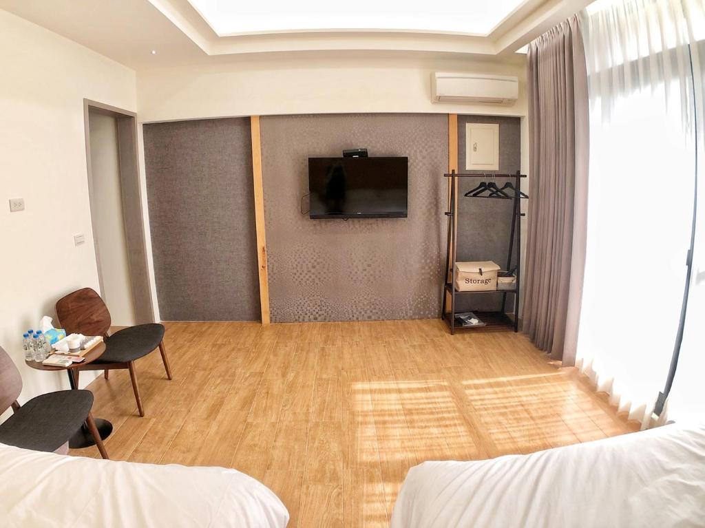 TV a/nebo společenská místnost v ubytování Alishan Zhuqi Homestay #57