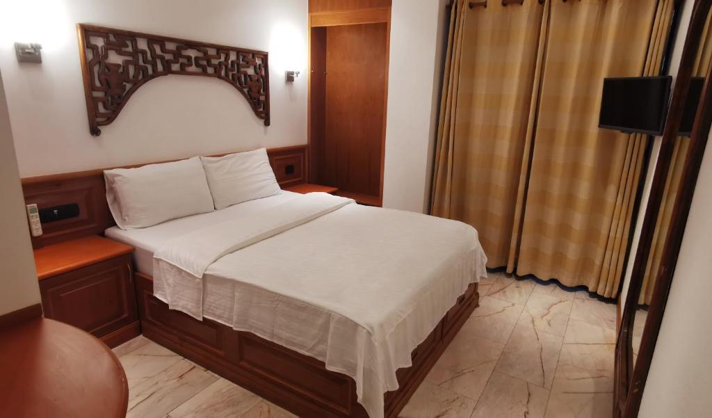 Postel nebo postele na pokoji v ubytování Max Residence