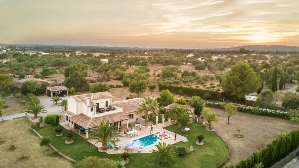 an aerial view of a house with a swimming pool at Villa Sun Club home in Llucmajor