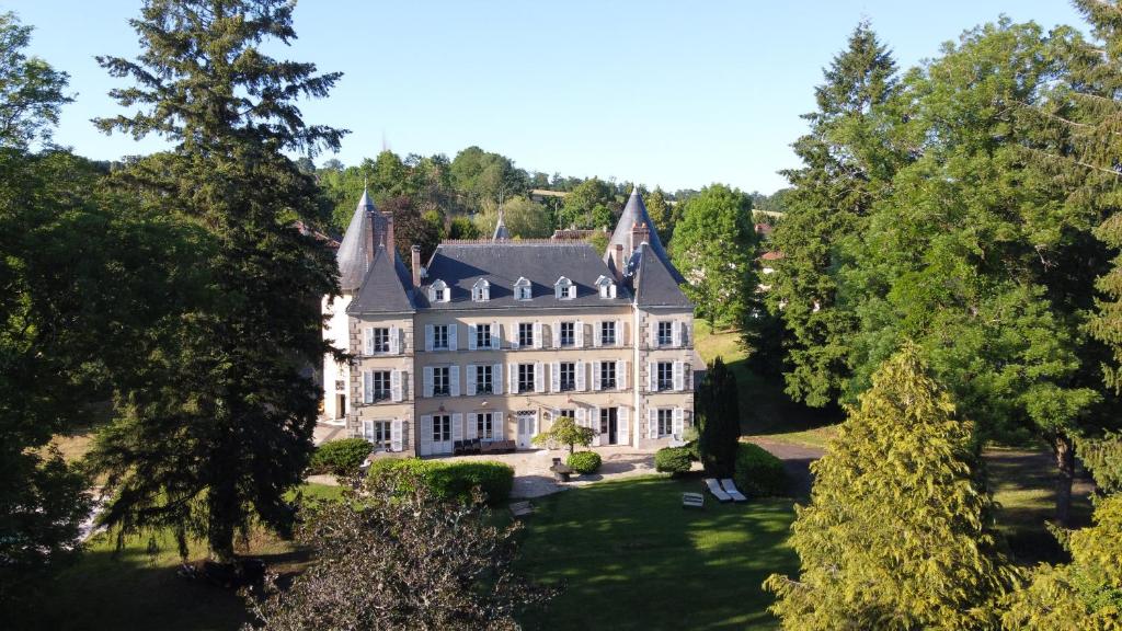 an aerial view of a mansion with trees at Château La Briance 