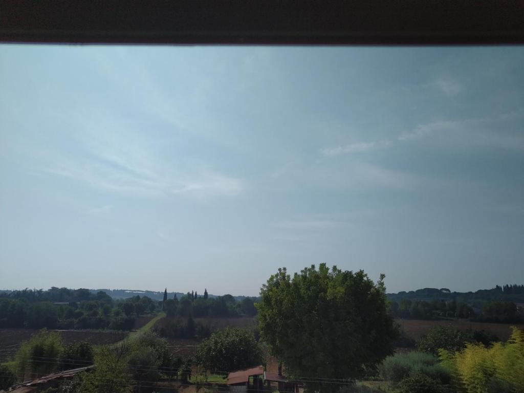 a view of the countryside from a window at CASA DI ALFEO in Perugia