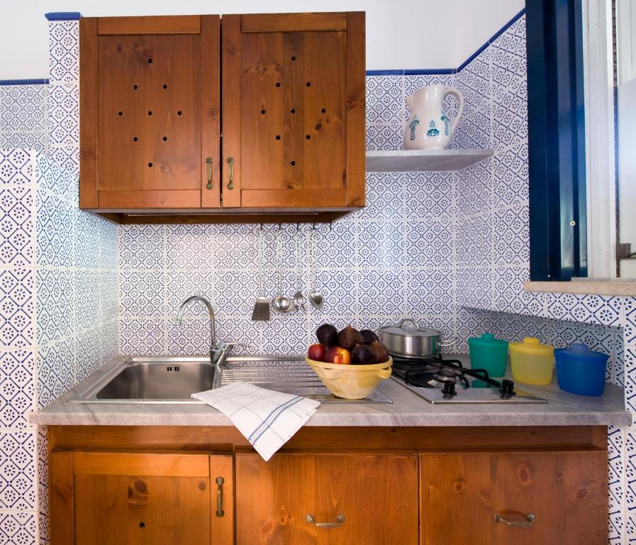 Kuchyň nebo kuchyňský kout v ubytování Miramare Residence