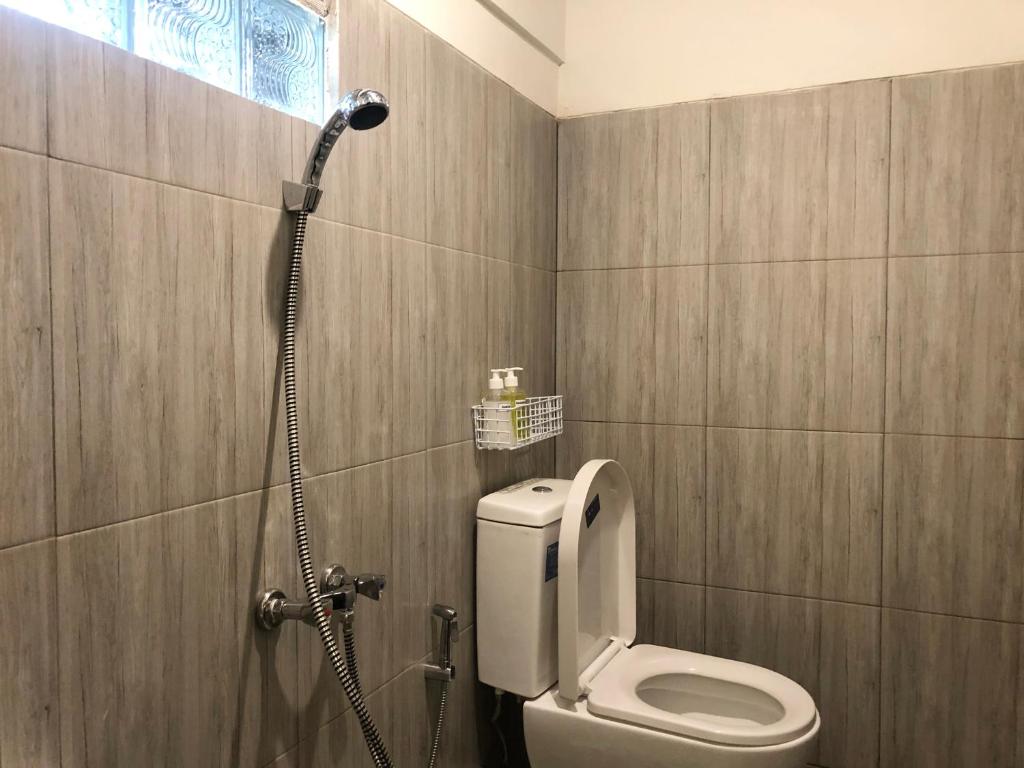 Koupelna v ubytování Bamboe Inn Homestay