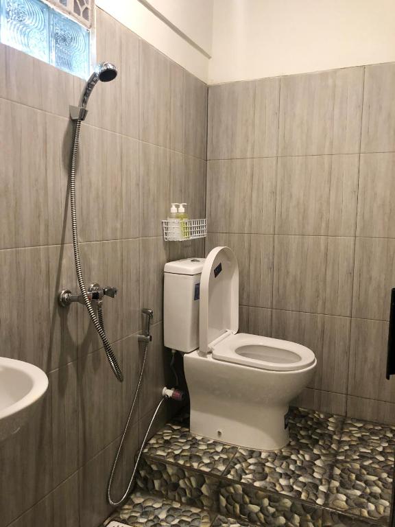 Koupelna v ubytování Bamboe Inn Homestay