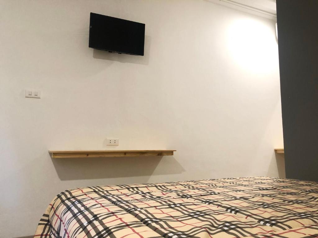 TV a/nebo společenská místnost v ubytování Bamboe Inn Homestay