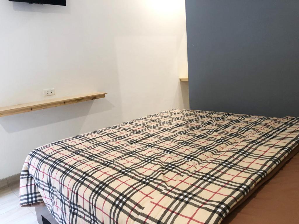 Postel nebo postele na pokoji v ubytování Bamboe Inn Homestay