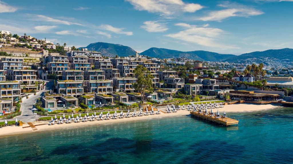 an aerial view of a resort on a beach at Kaya Palazzo Resort & Residences Le Chic Bodrum in Bodrum City
