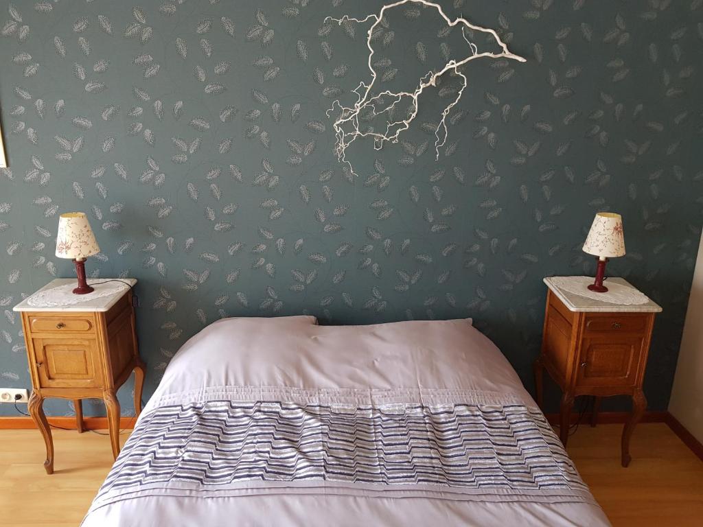 Postel nebo postele na pokoji v ubytování La Source d'Arimont