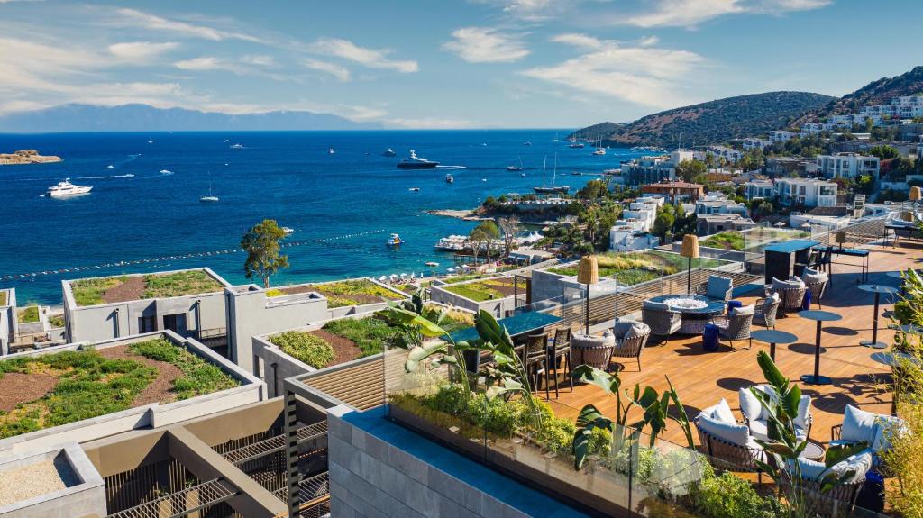 a view of the ocean from a building at Kaya Palazzo Resort & Residences Le Chic Bodrum in Bodrum City