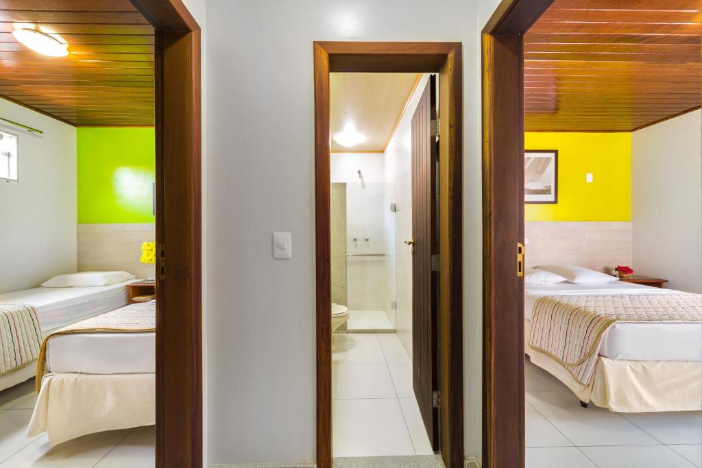 Postel nebo postele na pokoji v ubytování Quinta do Sol Lite Praia Hotel