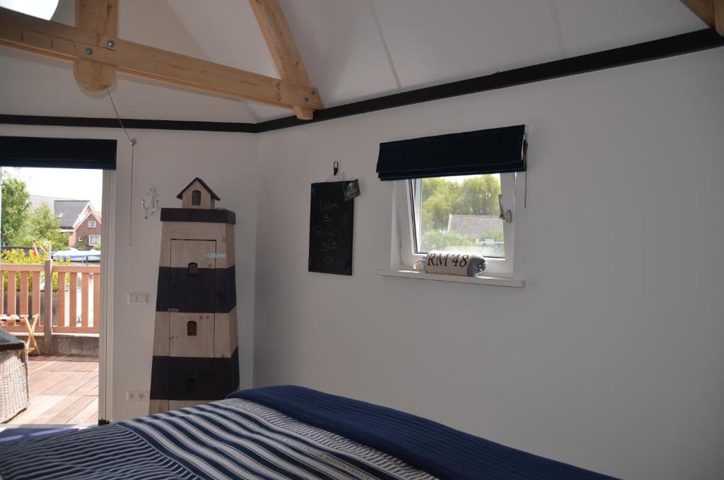 Postel nebo postele na pokoji v ubytování Froukje's B&B