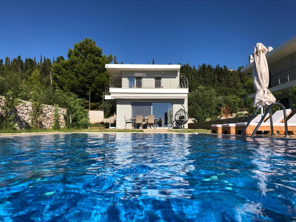 Bazén v ubytování Vento Villas nebo v jeho okolí