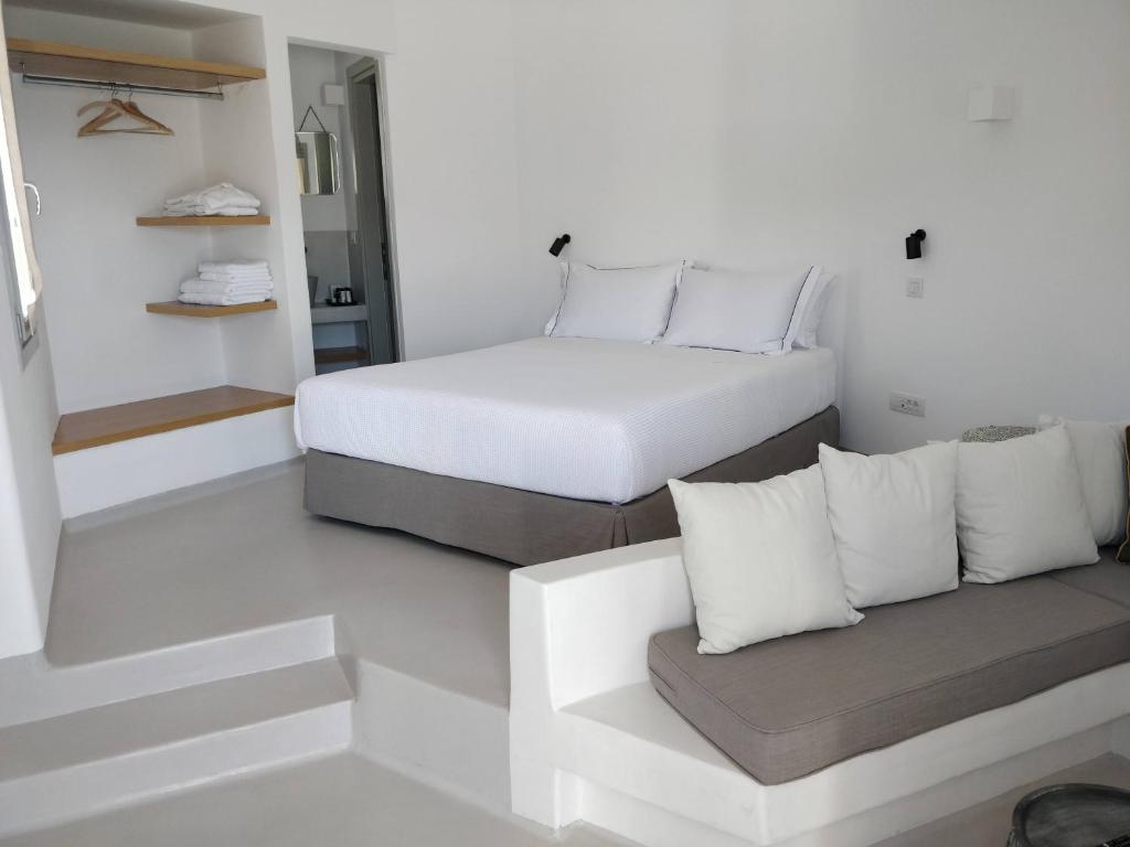 A bed or beds in a room at Psathaki