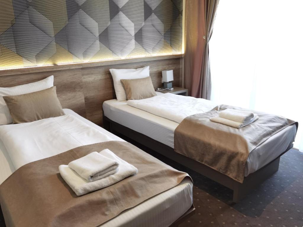 Postel nebo postele na pokoji v ubytování Student Hotel Mostar
