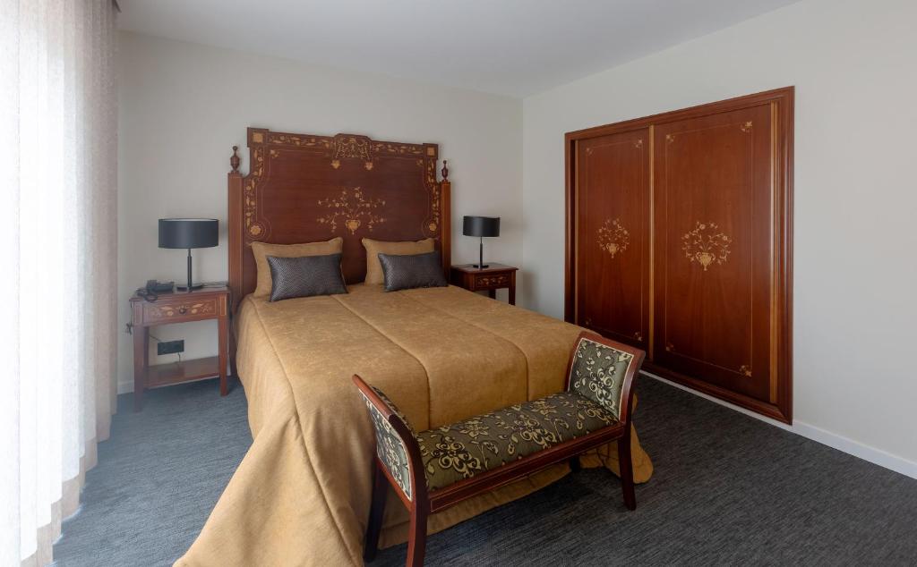 Postel nebo postele na pokoji v ubytování Hotel Afonso V & SPA