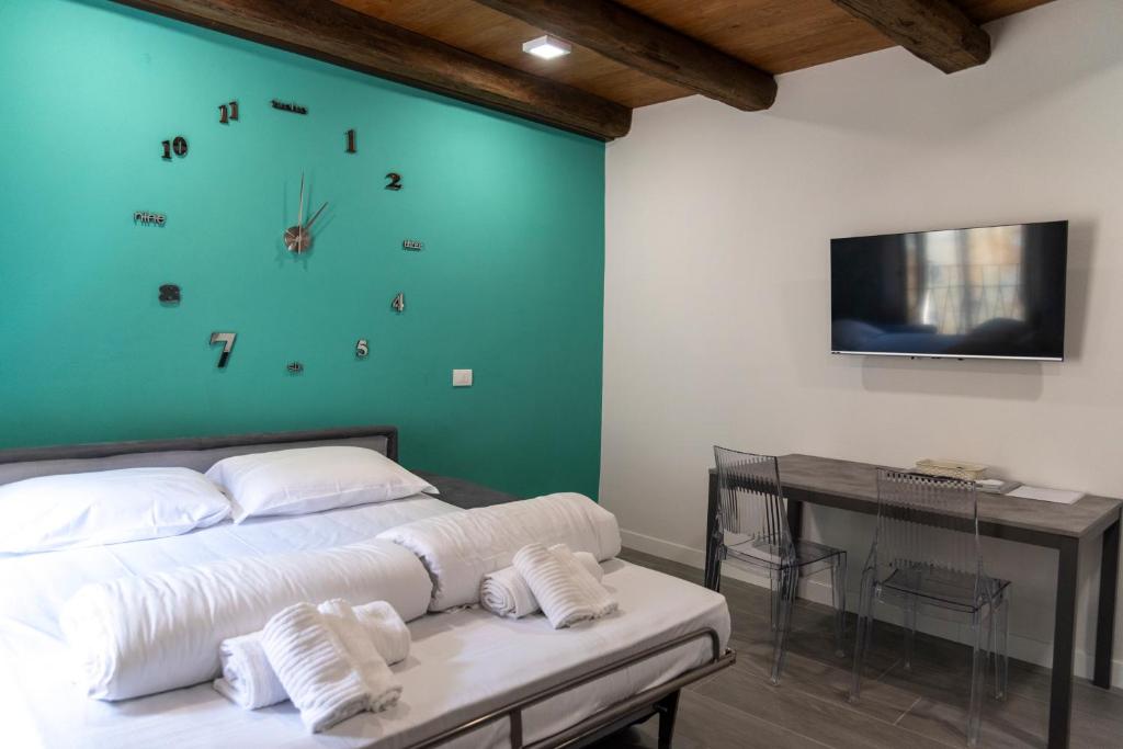 Letto o letti in una camera di Dimora Domese
