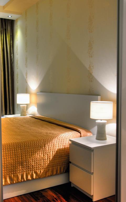 Postel nebo postele na pokoji v ubytování Apartments Athos