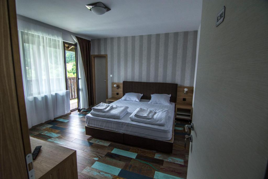 Postel nebo postele na pokoji v ubytování Veykata Resort & Spa