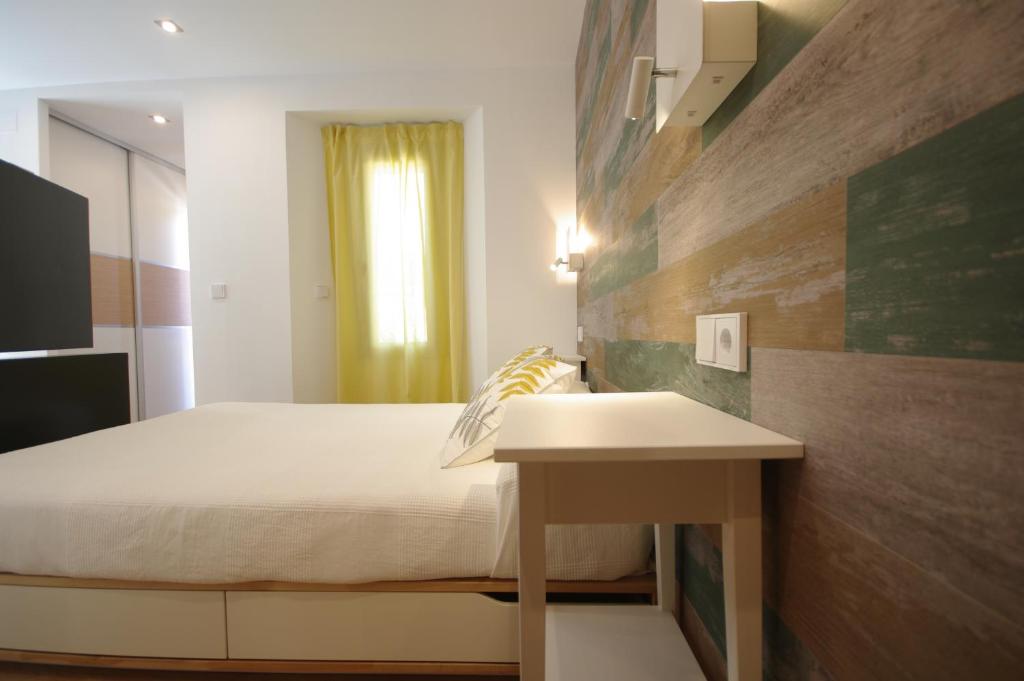 Ένα ή περισσότερα κρεβάτια σε δωμάτιο στο La casita de Sofi