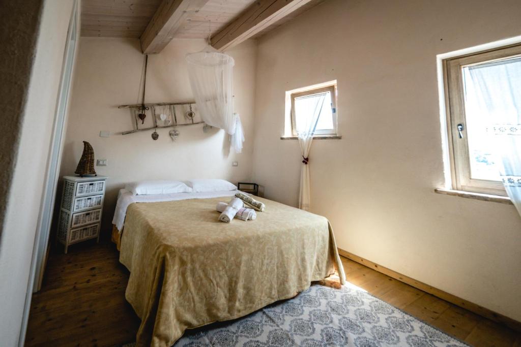 Postel nebo postele na pokoji v ubytování Colle Regnano