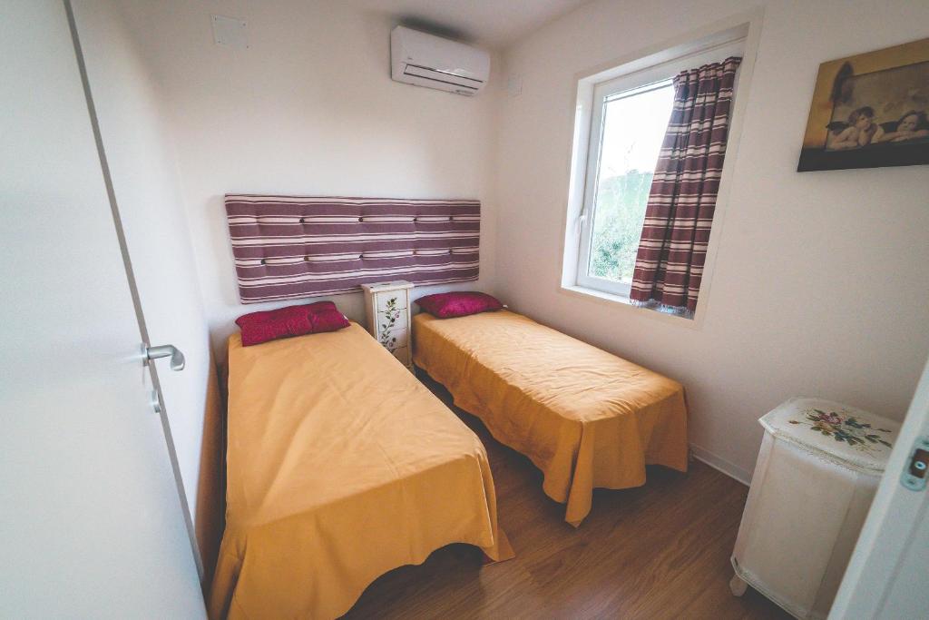Postel nebo postele na pokoji v ubytování Colle Regnano