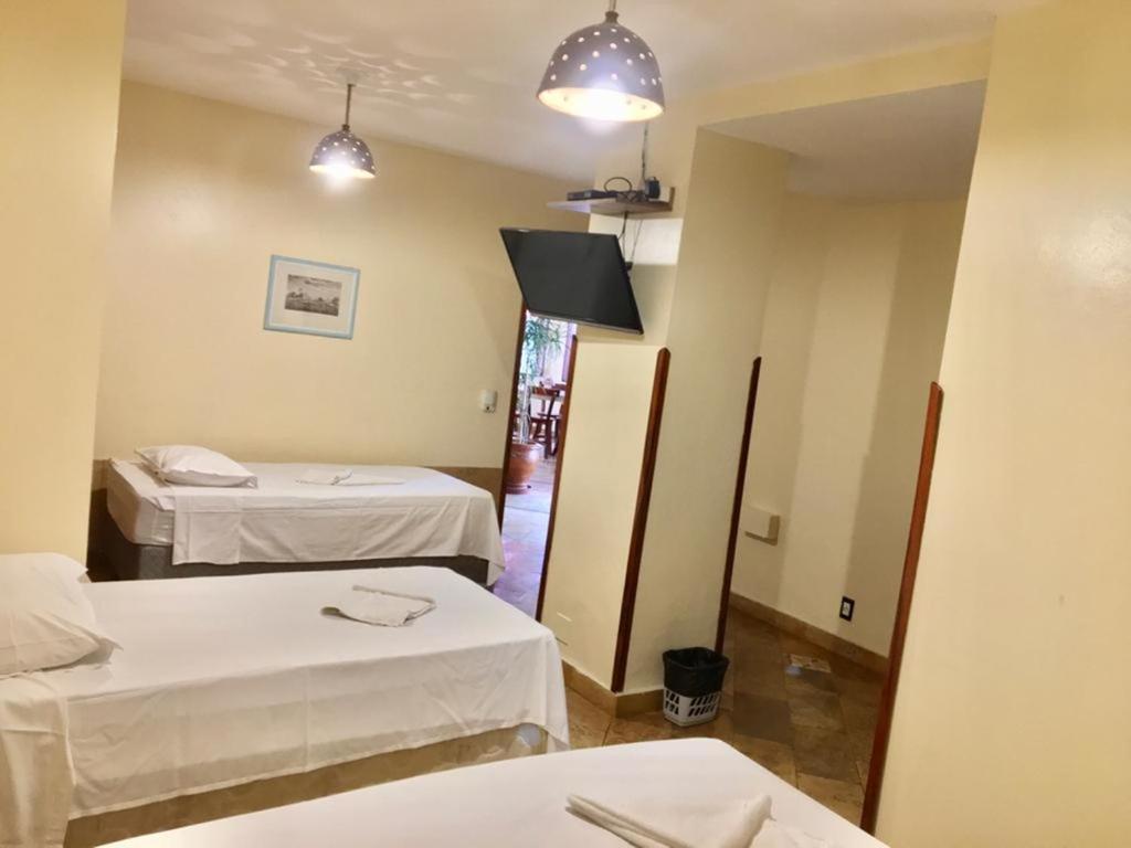 Postel nebo postele na pokoji v ubytování Pousada Fortal Villa Praia