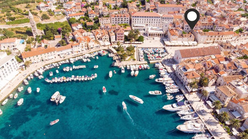 an aerial view of a harbor with boats in the water at Rooms and Apartments Villa Town Gate Hvar in Hvar