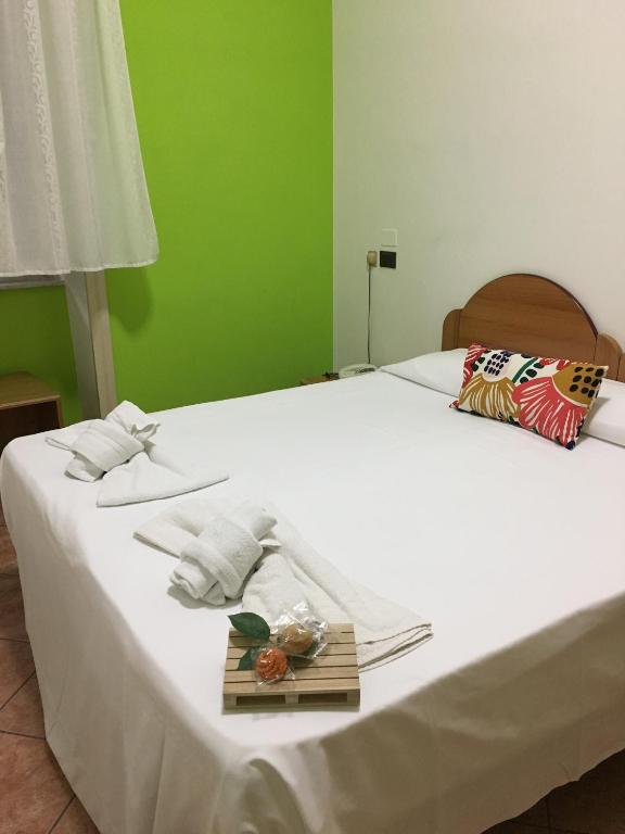 Posteľ alebo postele v izbe v ubytovaní Paradiso della Zagara