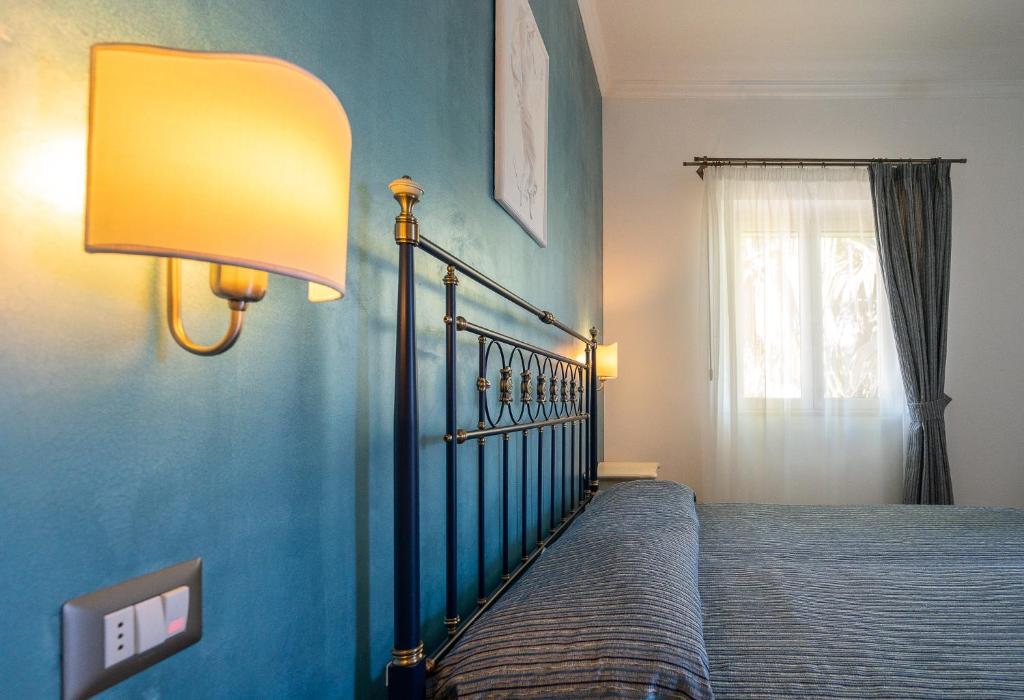 Cama ou camas em um quarto em Hotel Boutique Il Castellino Relais