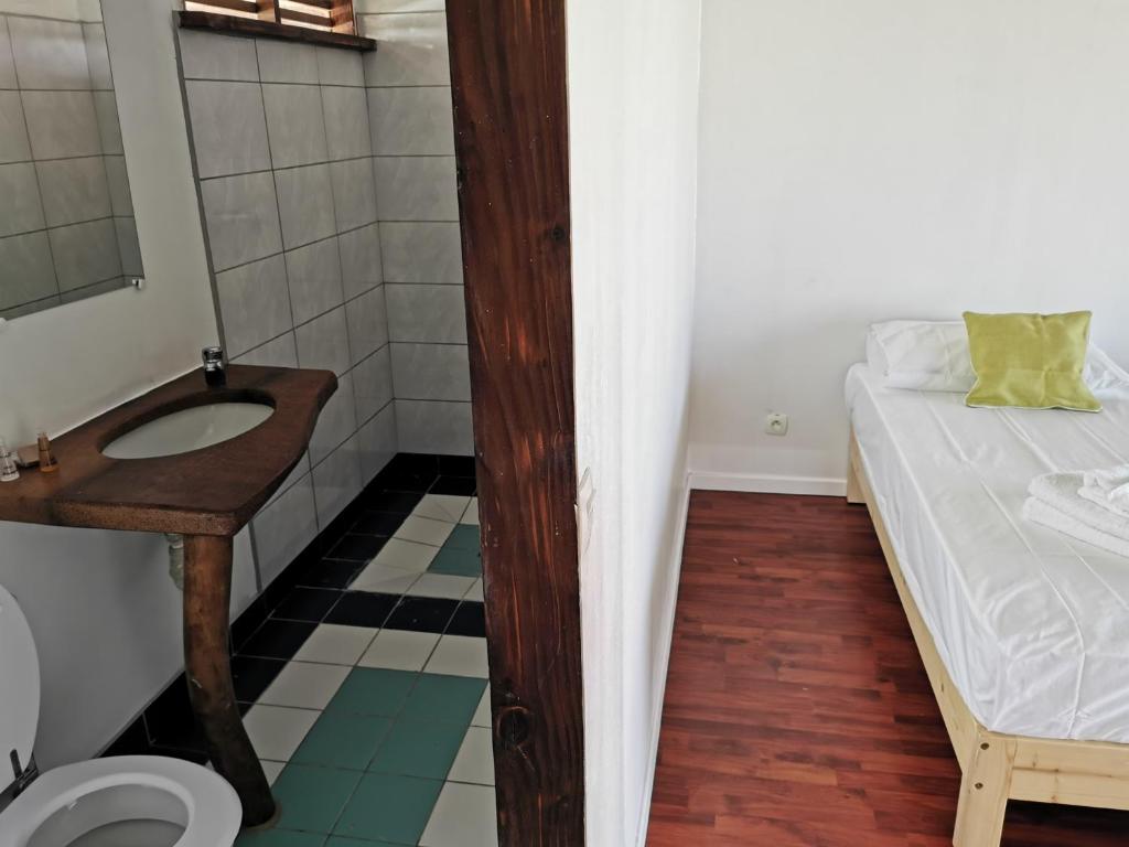 Postel nebo postele na pokoji v ubytování AOTERA GUEST HOUSE