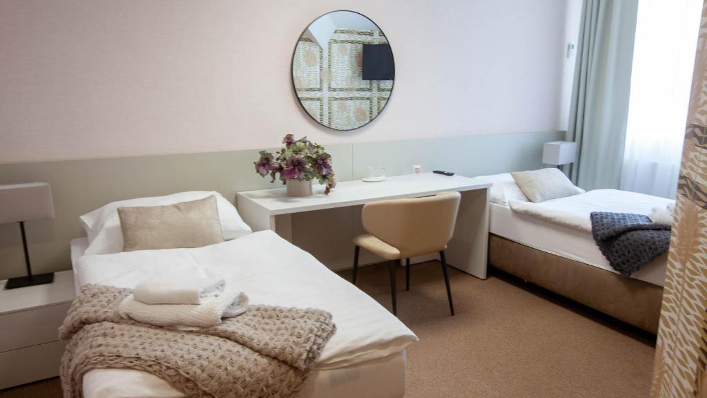 Postel nebo postele na pokoji v ubytování Penzion Solid Spa
