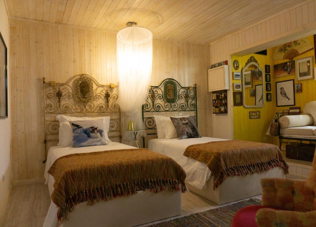 Кровать или кровати в номере Casa da Almoinha