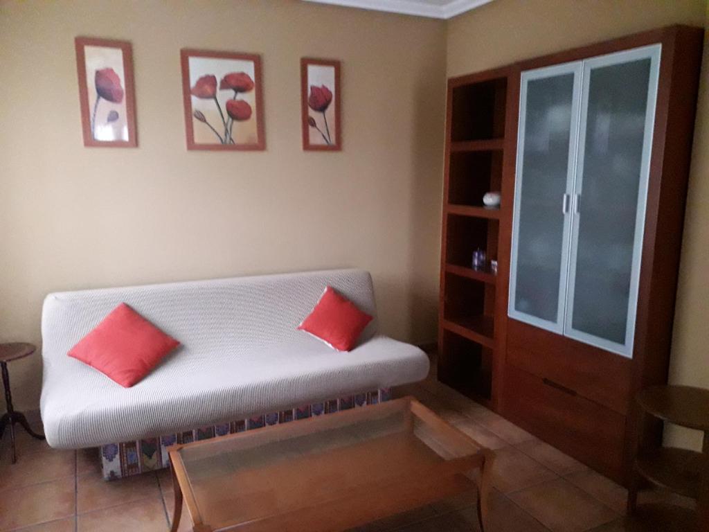 A seating area at Apartamentos Los Frutales