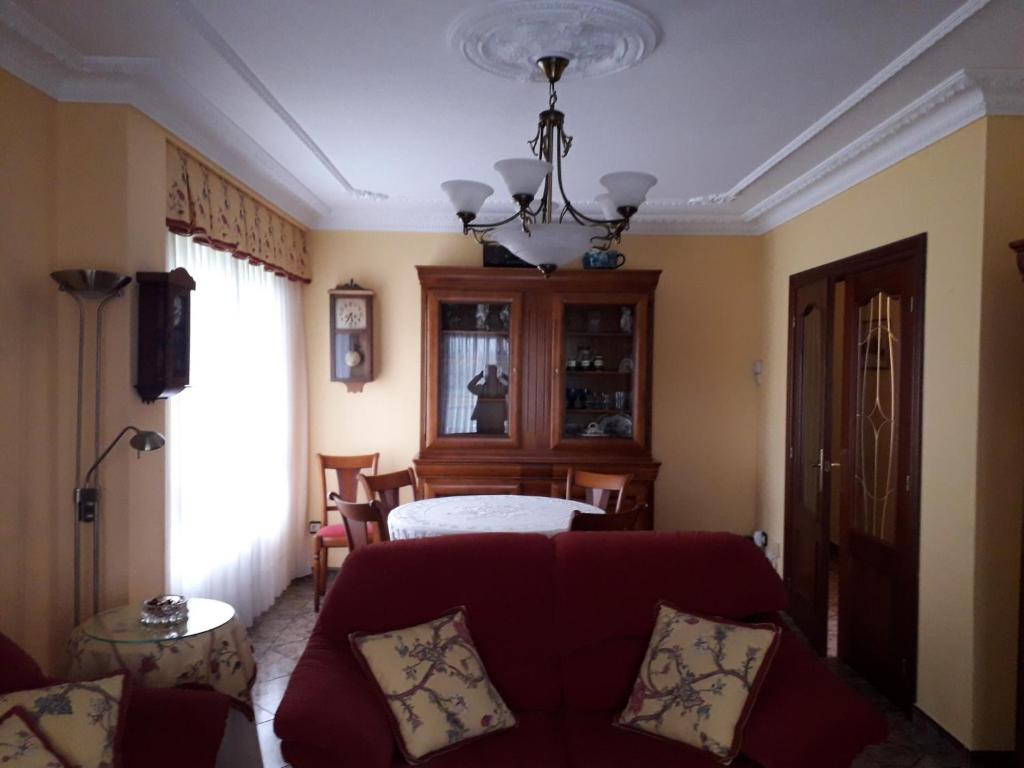 A bed or beds in a room at Apartamentos Los Frutales