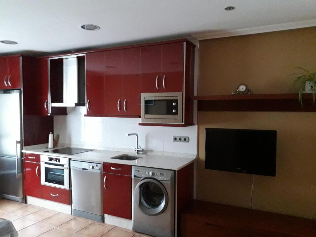 A kitchen or kitchenette at Apartamentos Los Frutales