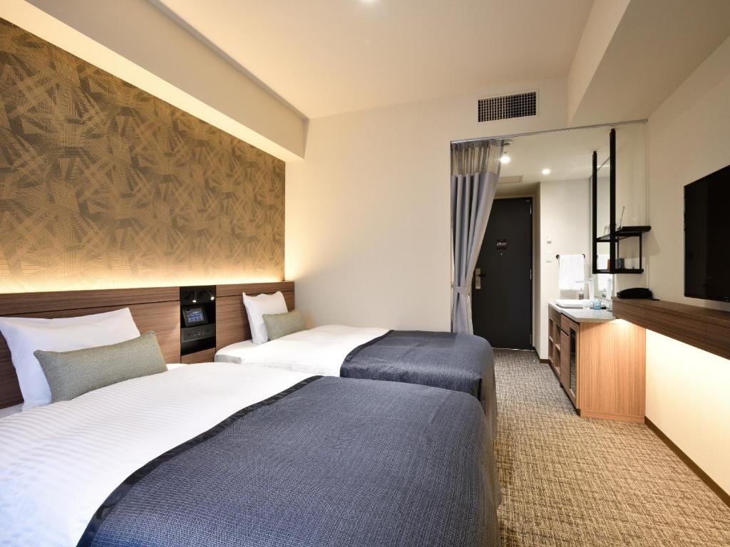 TV a/nebo společenská místnost v ubytování Hotel Keihan Sendai