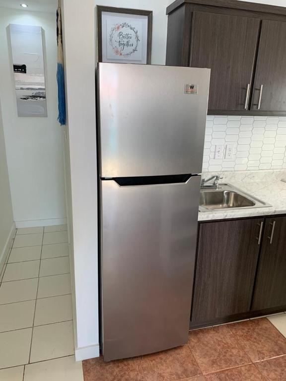 Kuchyň nebo kuchyňský kout v ubytování Mar Bonita Beach Apartment