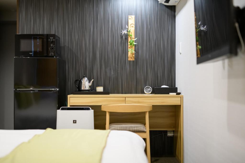Kuchyň nebo kuchyňský kout v ubytování JP INN Kyoto Ekimae Mongakucho