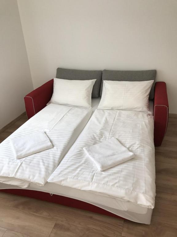 Posteľ alebo postele v izbe v ubytovaní Veritas Apartment Zamárdi