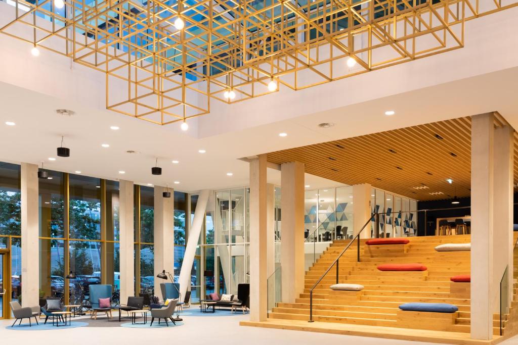 a view of the lobby of the office building at Holiday Inn Express Amsterdam - North Riverside by IHG in Amsterdam