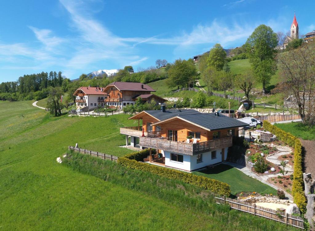 an aerial view of a house in a field at Chalet Frieda in Mühlbach