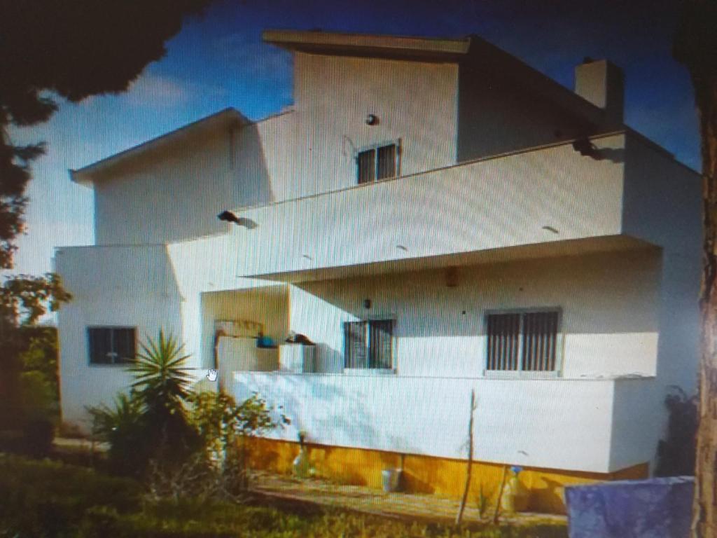 a large white building with aventh floor at Villa Alma in Bari