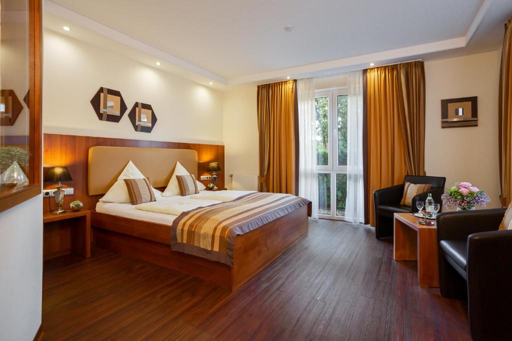 Postel nebo postele na pokoji v ubytování Hotel Mutter-Bahr