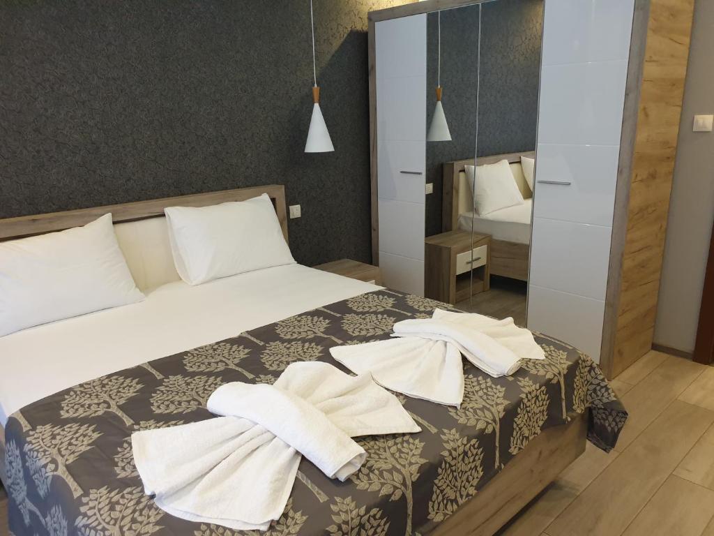 Postel nebo postele na pokoji v ubytování MitProt Panorama Bay 2 luks apartment 102