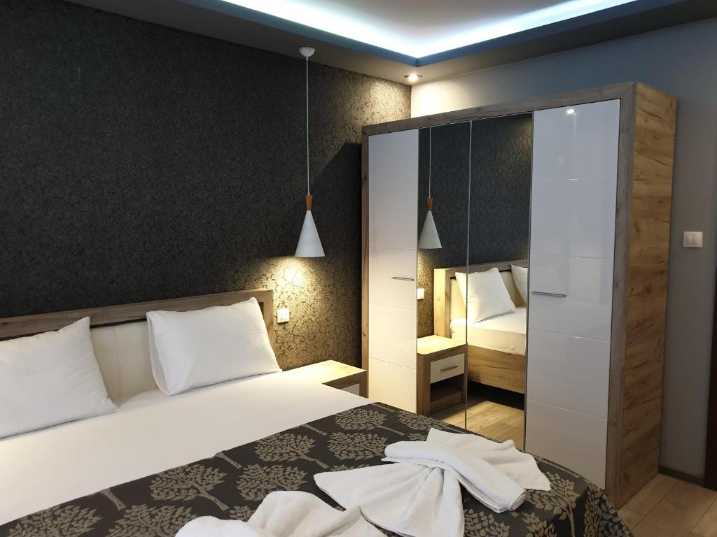 Postel nebo postele na pokoji v ubytování MitProt Panorama Bay 2 luks apartment 102