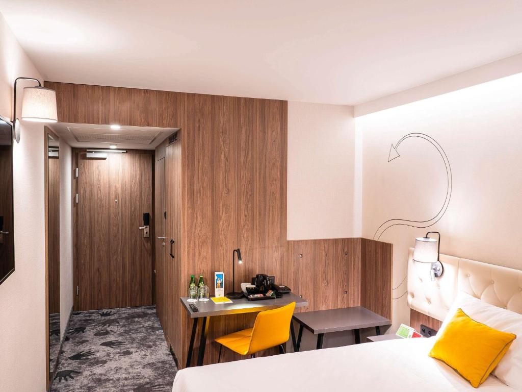 Posteľ alebo postele v izbe v ubytovaní ibis Styles Lublin Stare Miasto